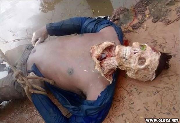 Estuprador e amarrado de cabeca para baixo em rio cheio de piranhas 5